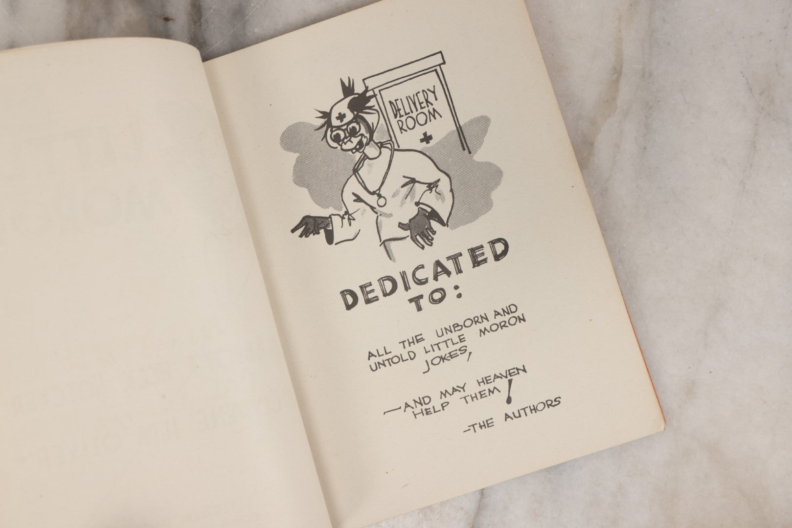 Lot 159 - "Little Moron" Vintage Comic Illustrated Joke Book Vintage Humor Book By Abbot “Heck” Hoecker And Clydene “Ilda” Oliver, Copyright 1943