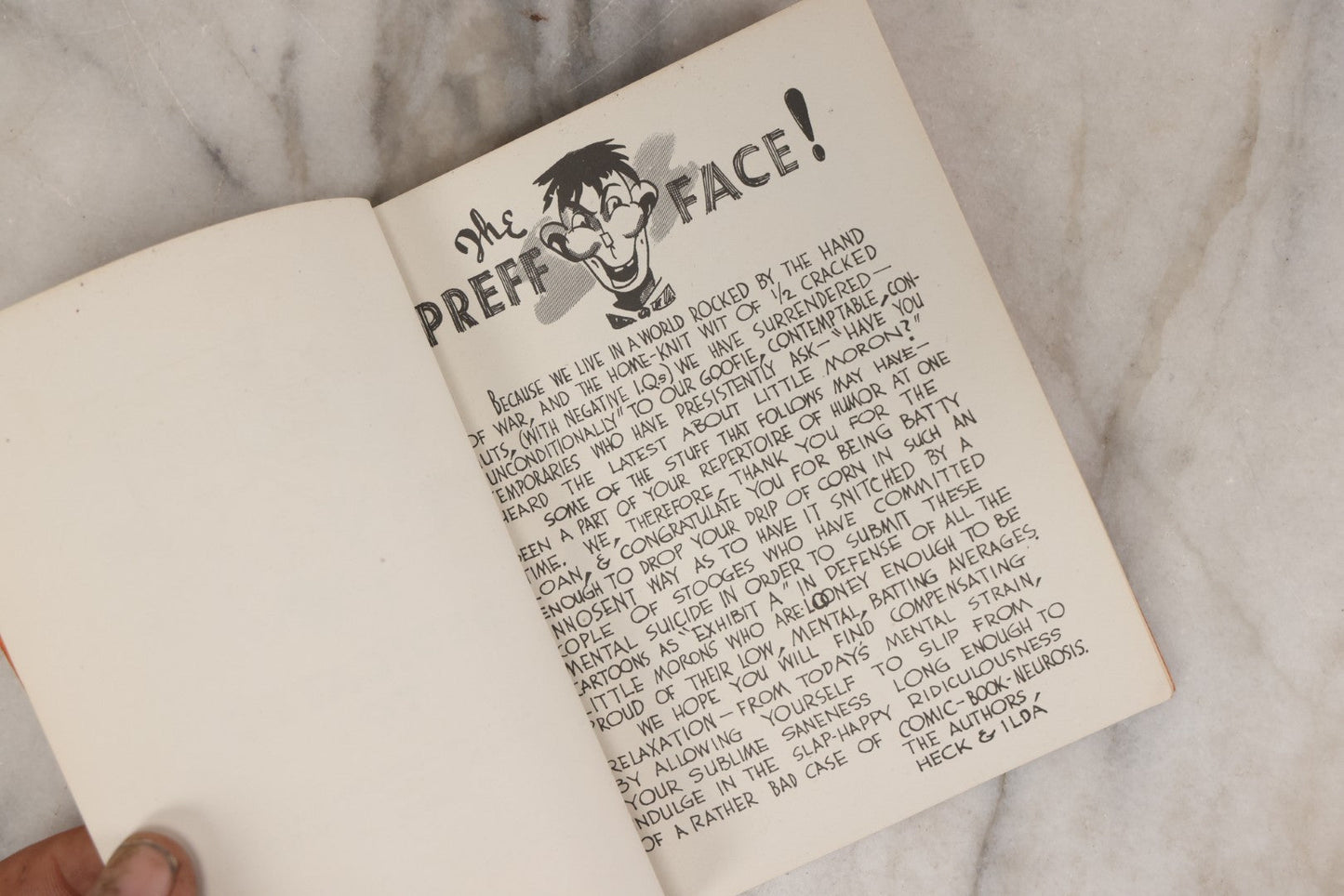 Lot 159 - "Little Moron" Vintage Comic Illustrated Joke Book Vintage Humor Book By Abbot “Heck” Hoecker And Clydene “Ilda” Oliver, Copyright 1943