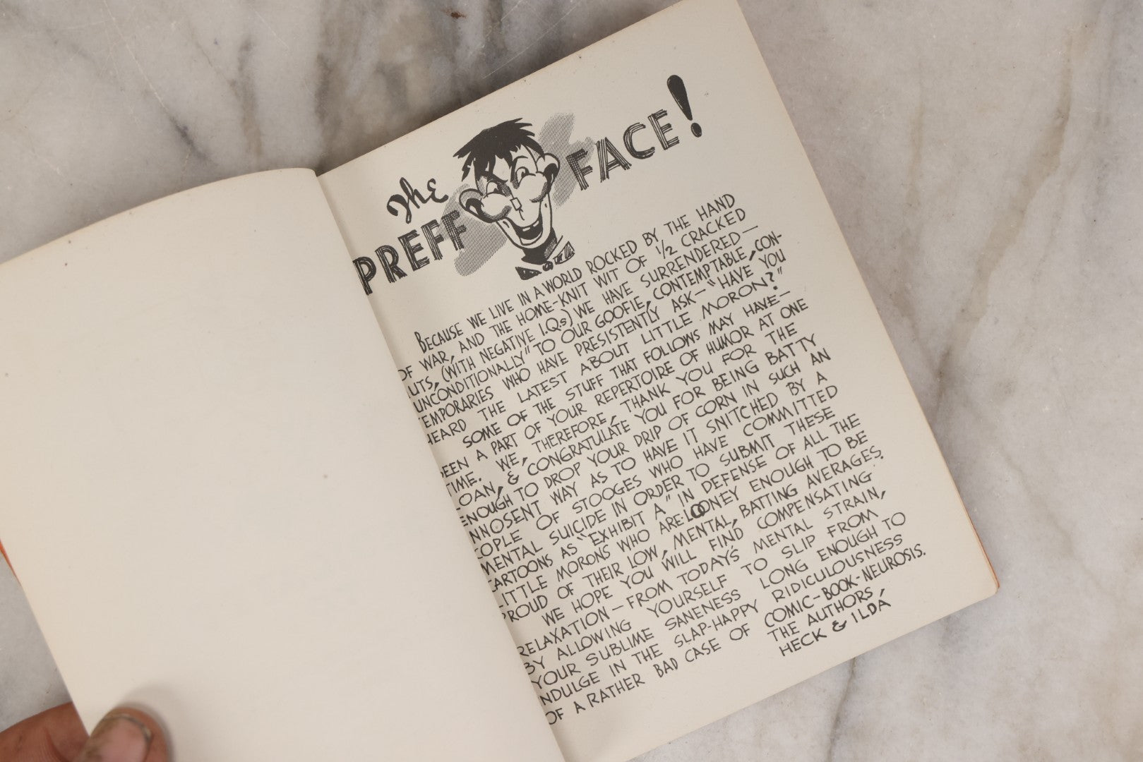 Lot 159 - "Little Moron" Vintage Comic Illustrated Joke Book Vintage Humor Book By Abbot “Heck” Hoecker And Clydene “Ilda” Oliver, Copyright 1943