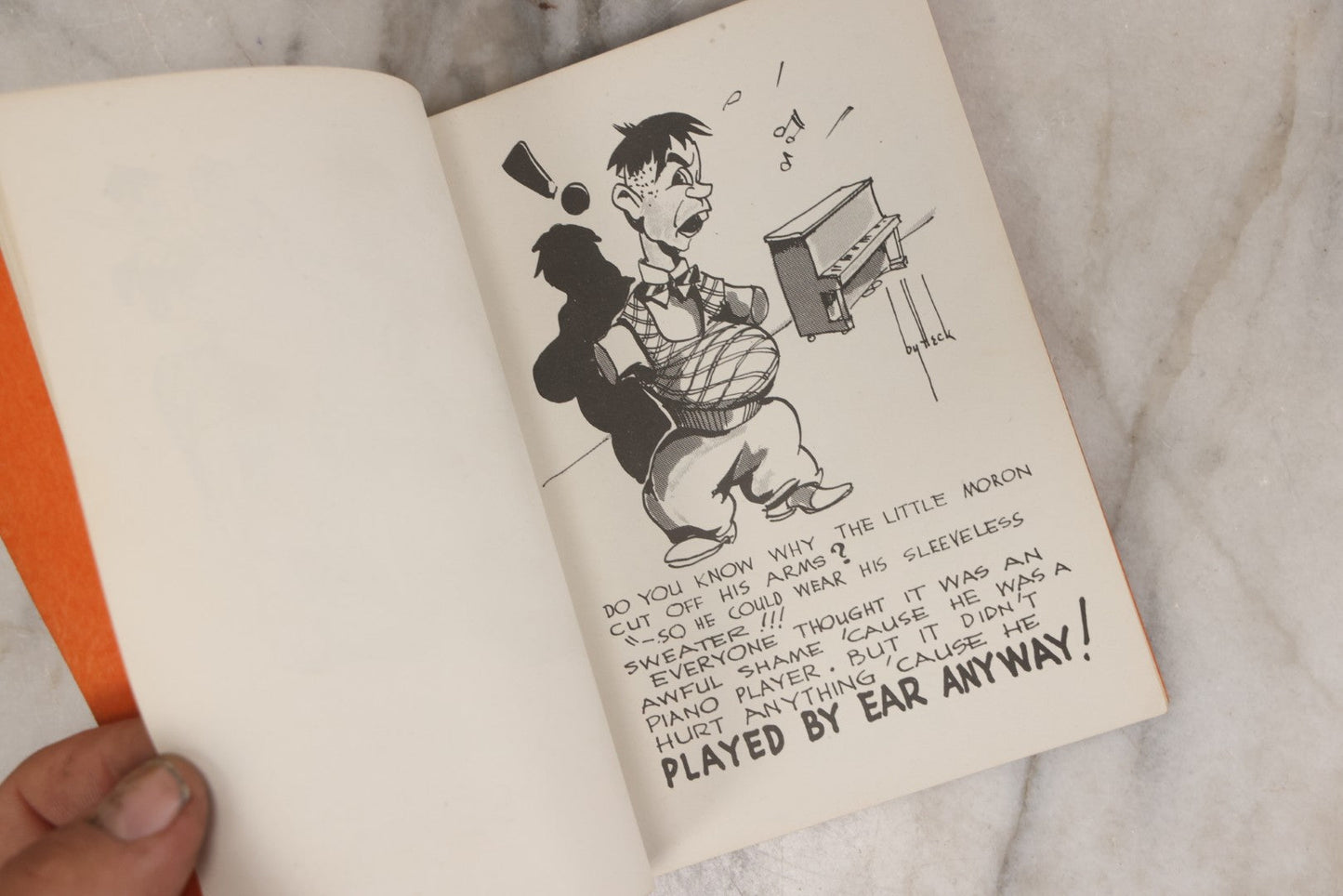 Lot 159 - "Little Moron" Vintage Comic Illustrated Joke Book Vintage Humor Book By Abbot “Heck” Hoecker And Clydene “Ilda” Oliver, Copyright 1943