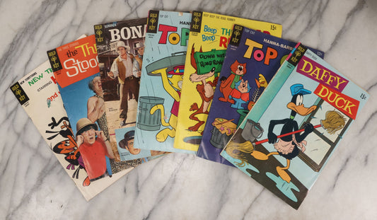 Lot 163 - Grouping Of Six Vintage Gold Key Comics, Including Daffy Duck, Heckle And Jeckle, Top Cat, Road Runner, The Three Stooges, And Bonanza