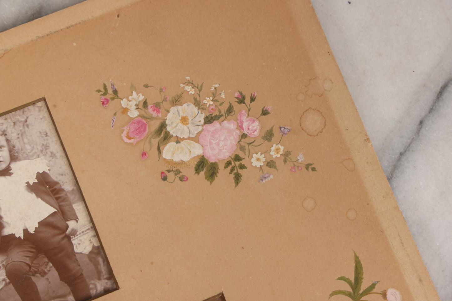 Lot 169 - Unframed Antique Memorial Page With Hand-Painted Flowers And Hand-Cut Mat, Including Photograph Of Young Child, Together With Cabinet Card Photograph Of Funeral Flower Arrangement Spelling “Baby,” By E.S. Dunshee & Co., Boston