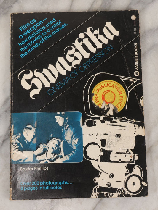 Lot 171 - "Swastika: Cinema Of Oppression" Vintage Paperback Book By Baxter Phillips, With Over 200 Photographs And 8 Pages In Full Color, Published By Warner Books, 1976