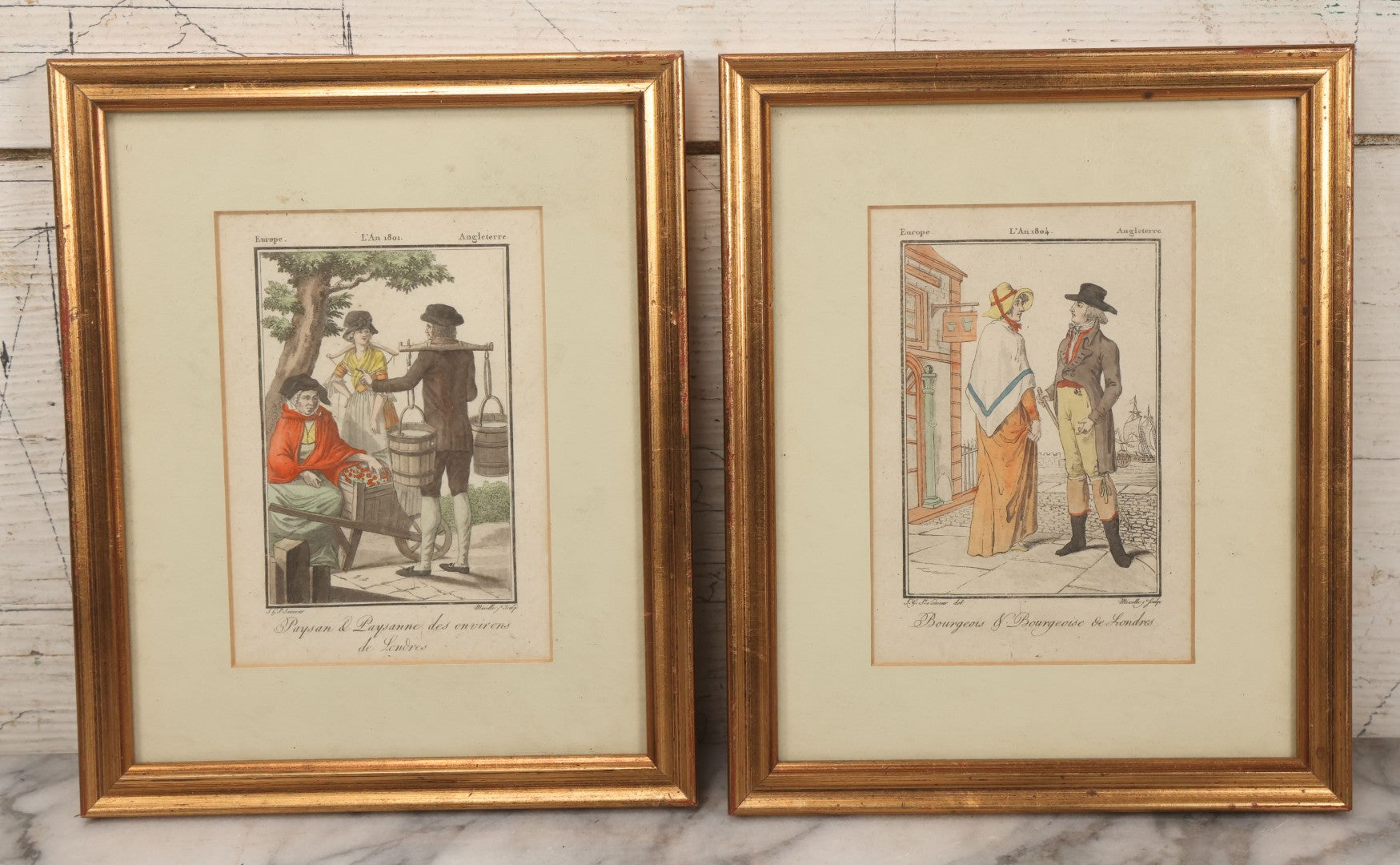 Lot 174 - Pair Of Antique French Hand-Colored Prints “Paysan & Paysanne Des Environs De Londres” (“Peasant & Peasant Woman From The Environs Of London”), 1801, And “Bourgeois & Bourgeoise De Londres” (“Bourgeois Man & Woman Of London”), 1804