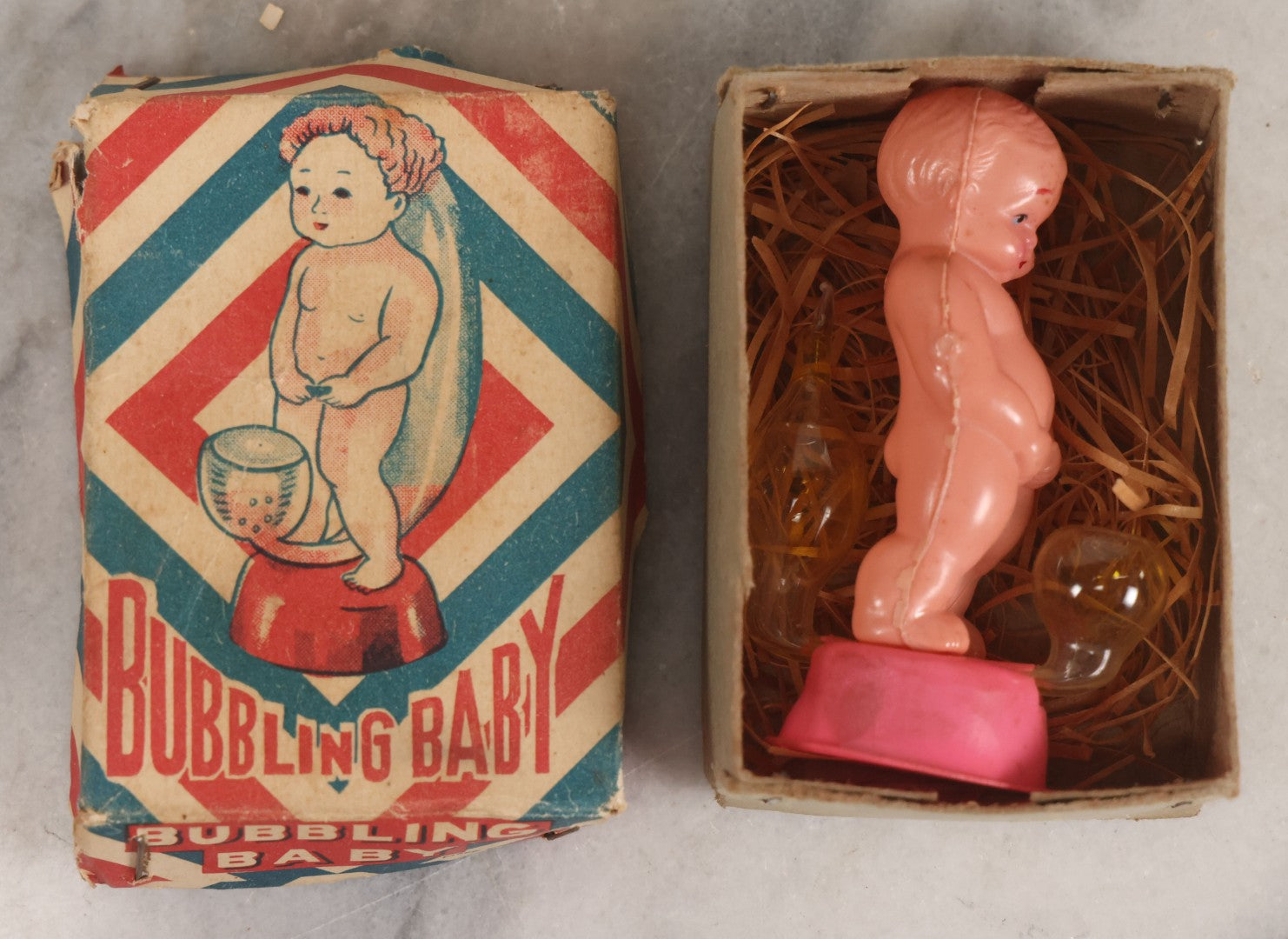 Lot 180 - Vintage "Bubbling Baby" Novelty Plastic Peeing Baby Toy In Original Box