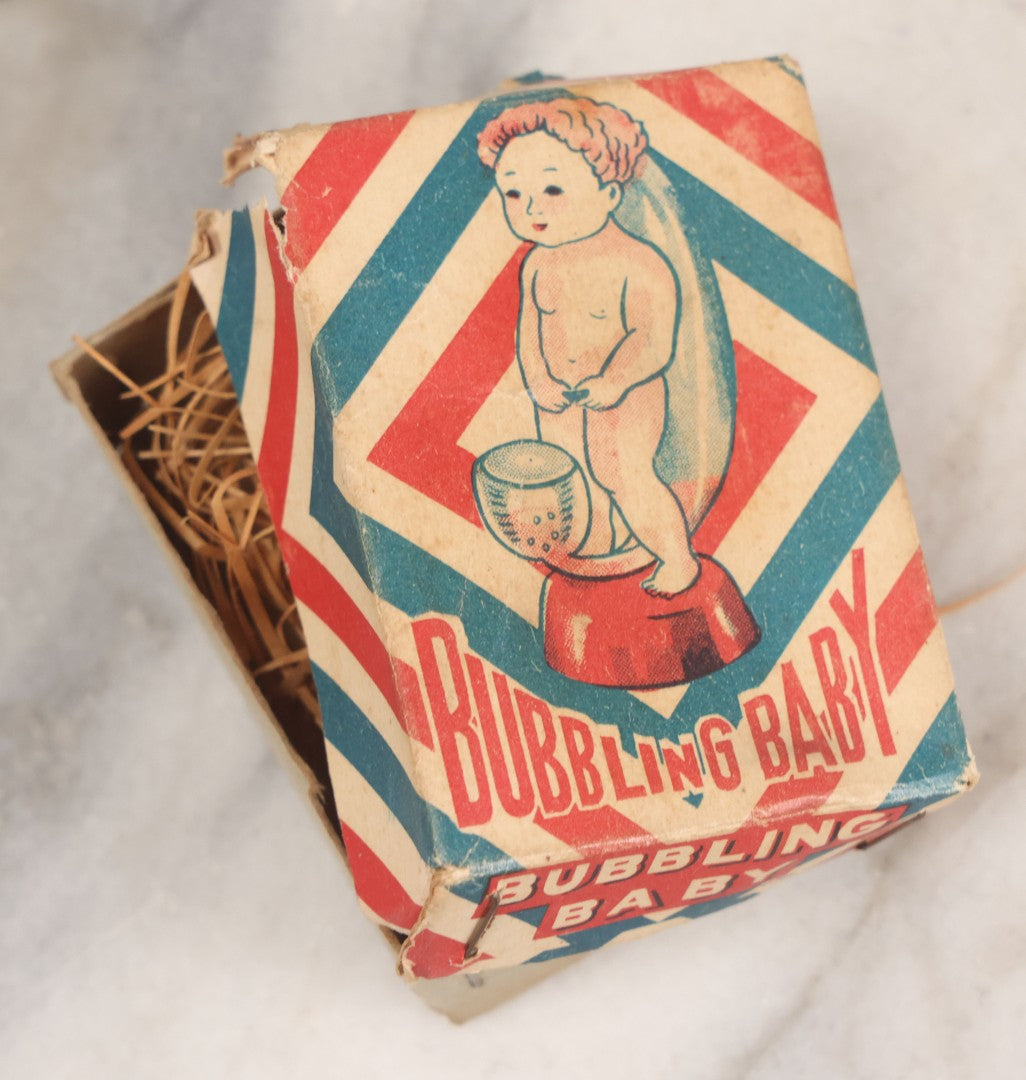 Lot 180 - Vintage "Bubbling Baby" Novelty Plastic Peeing Baby Toy In Original Box