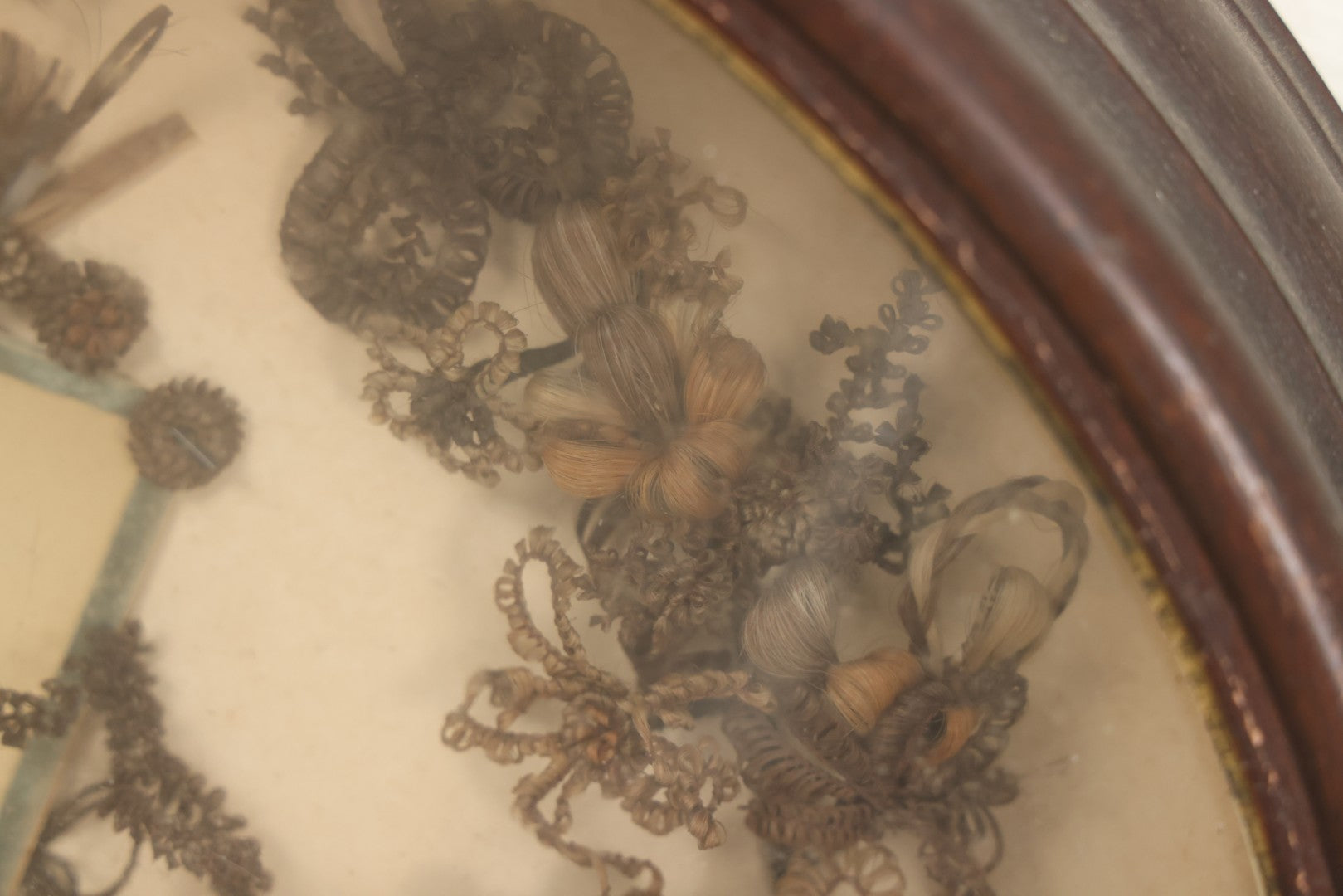 Lot 001 - Antique Victorian Mourning Memorial Human Hair Work Wreath In Deep Oval Shadowbox With Carte De Visite CDV Photograph Of Young Child In Blue Velvet Surround, 18-1/8" x 15-1/4"