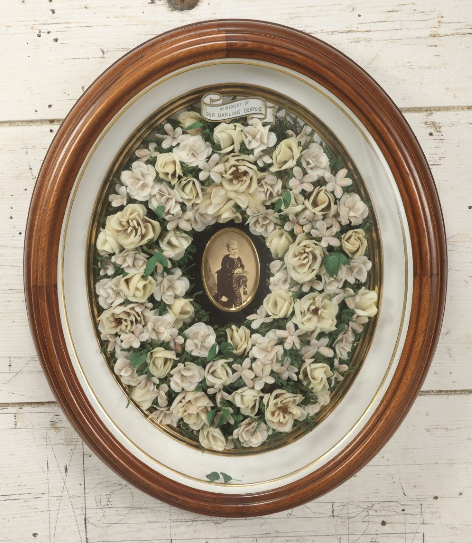 Lot 002 - Antique Victorian Mourning Memorial Preserved Flower Wreath "In Memory Of Our Darling George" In Original Deep Oval Shadowbox With Carte De Visite CDV Photograph And Hardy & Yarnall, Philadelphia Label, 17" x 20"