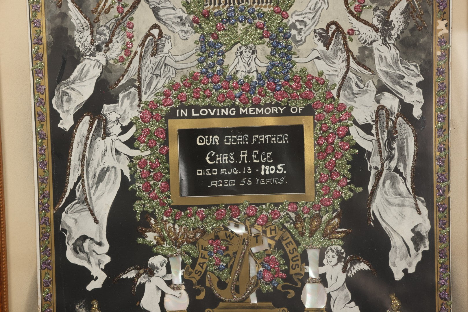 Lot 003 - Antique Edwardian Mourning Memorial Lithograph "In Loving Memory Of Our Dear Father Chas. E. Ege, Died August 13, 1905" With Gold And Glitter Accents, Mother Of Pearl Backing, Copyright 1903, William F. Hall, Philadelphia, 21-1/2" x 25-5/8"