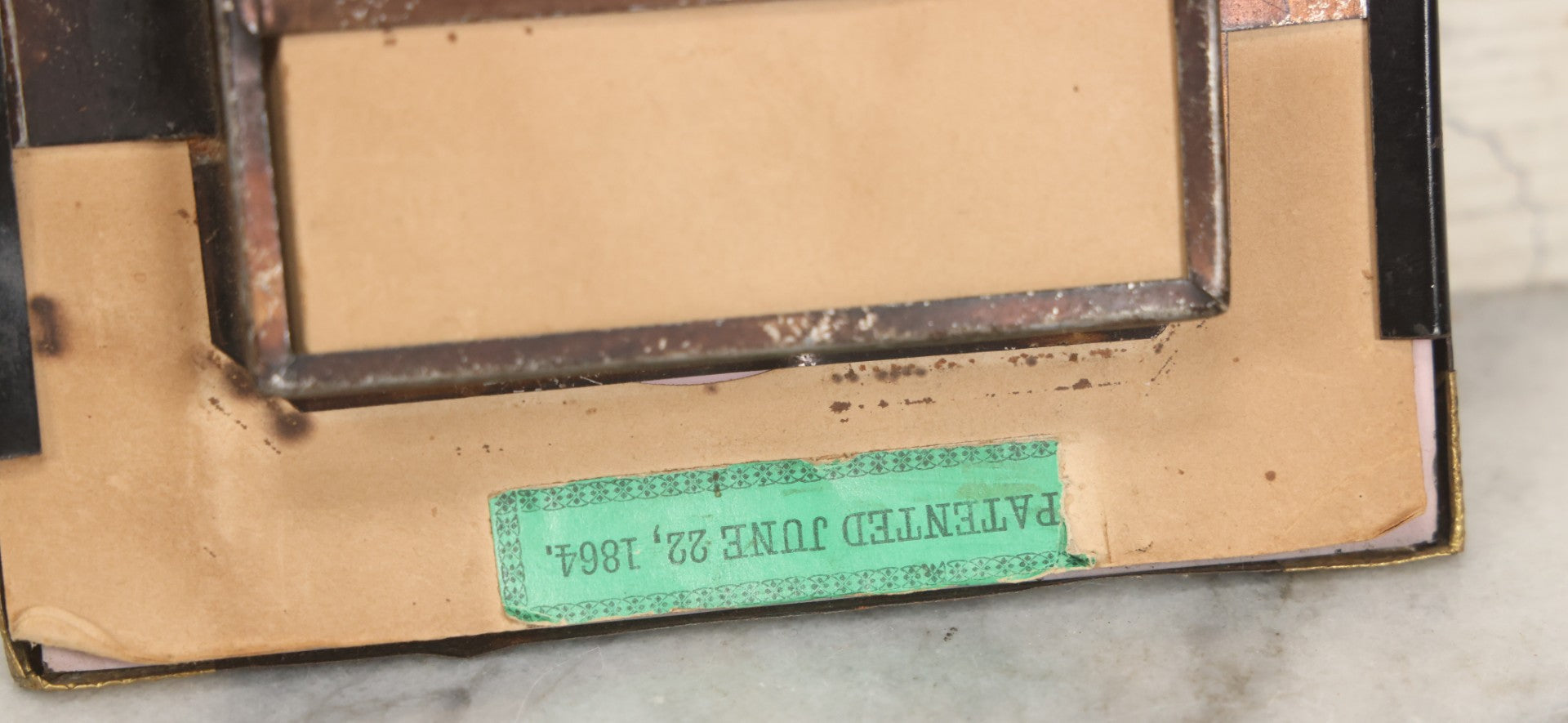 Lot 005 - Antique Shadow Box With Reverse Painted Glass And Seaweed, Shell, And Flower Cross Arrangement, Patented June 22, 1864, 5-1/4" x 6-1/8"