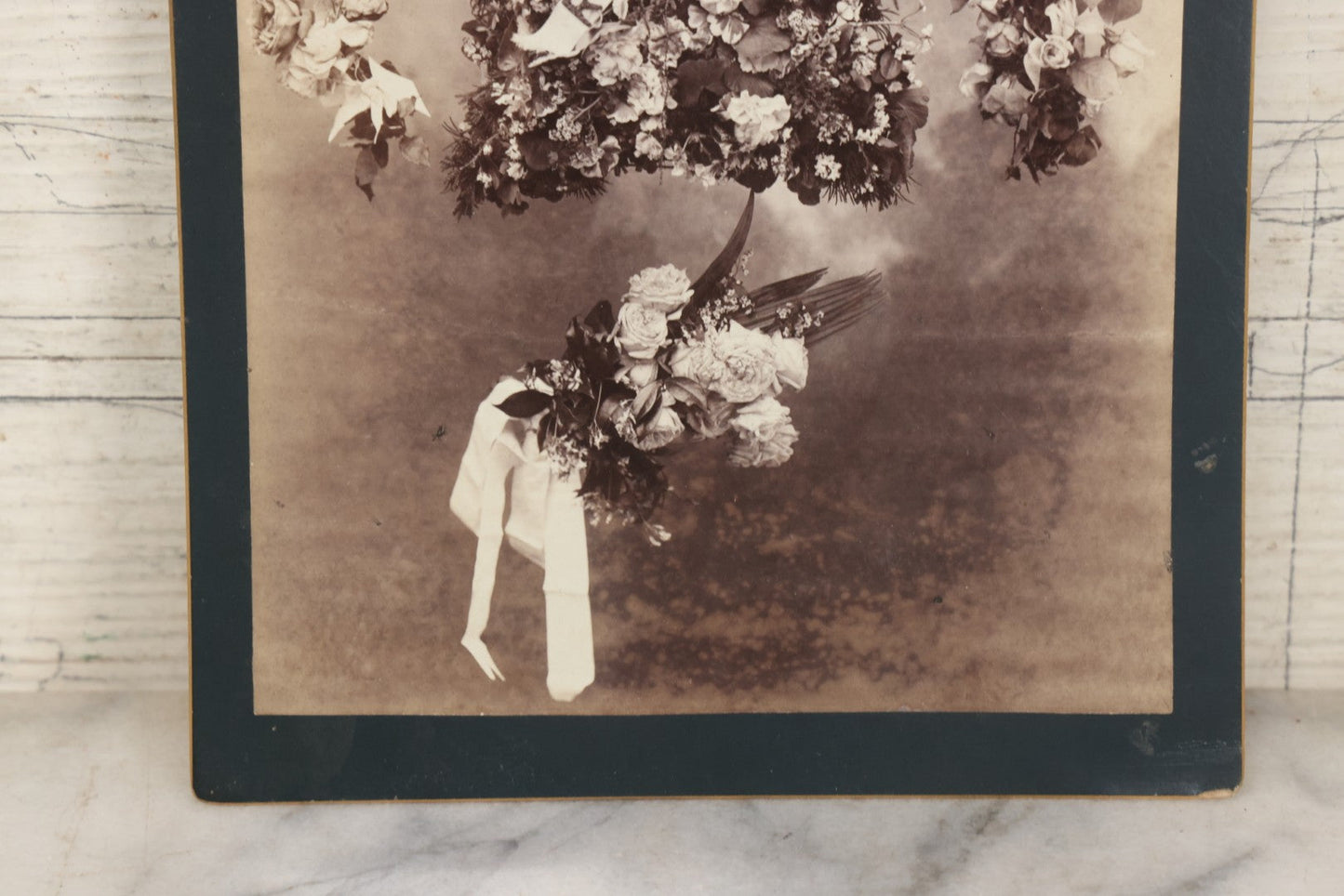 Lot 006 - Antique Boarded Mourning Photograph Depicting “Rest” Floral Pillow And Funeral Arrangements, 6-7/8" x 9-5/8"