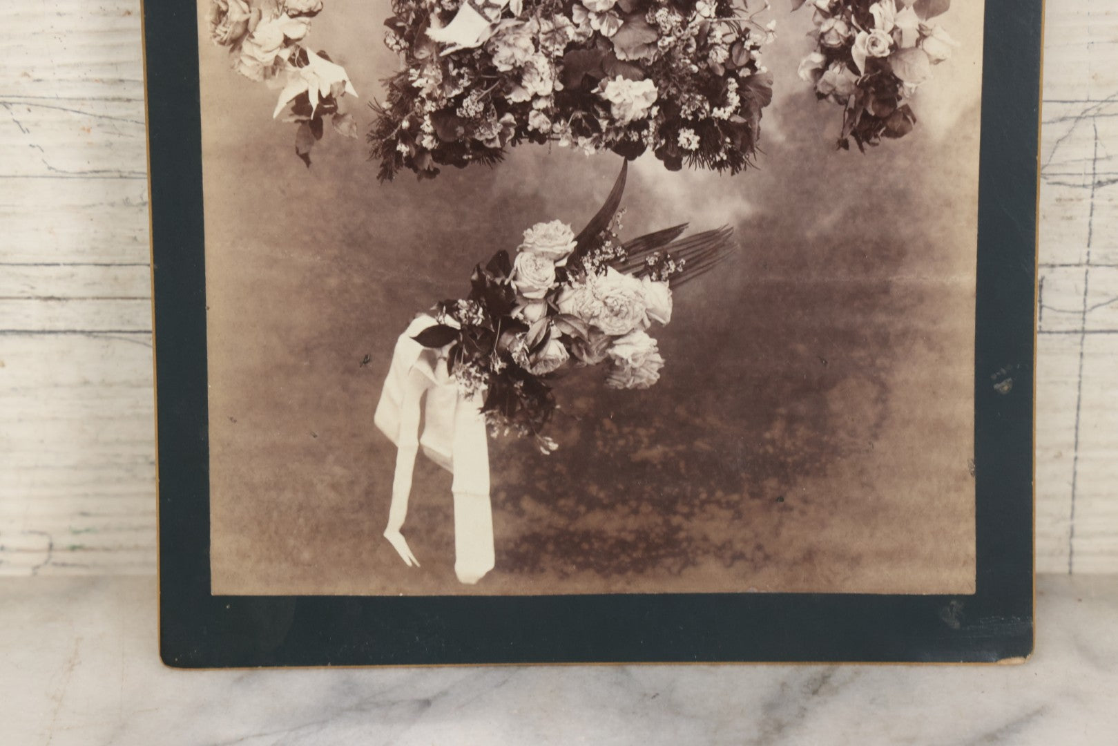 Lot 006 - Antique Boarded Mourning Photograph Depicting “Rest” Floral Pillow And Funeral Arrangements, 6-7/8" x 9-5/8"