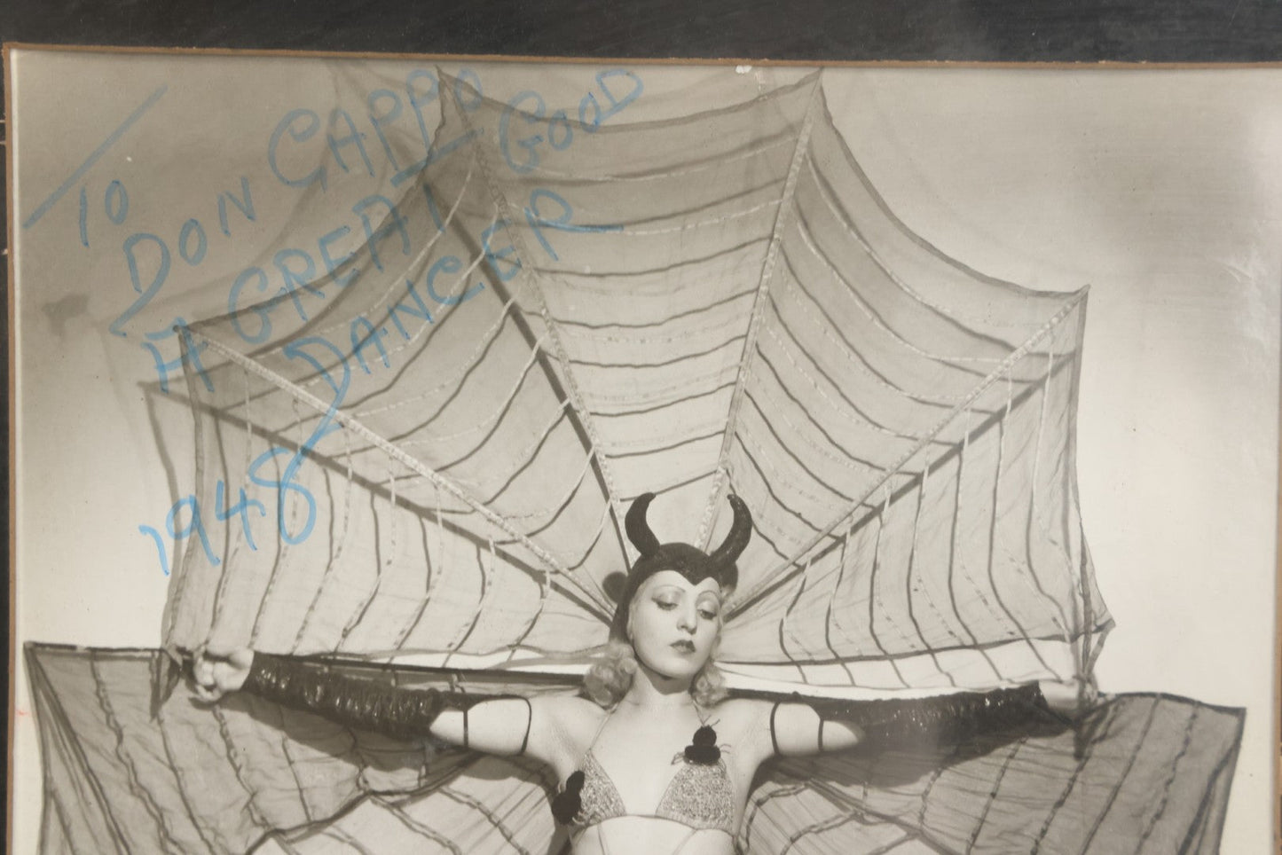 Lot 011 - Vintage Glossy Promotional Photograph Of Dancer In Risque Spider Costume, "Interpretation Of A Black Widow Spider," Photo By Murray Korman, New York City, Inscribed 1948 To Don Cappo, Possibly Depicting Dancer Lee Val, Framed, 11-3/4" x 13-3/4"