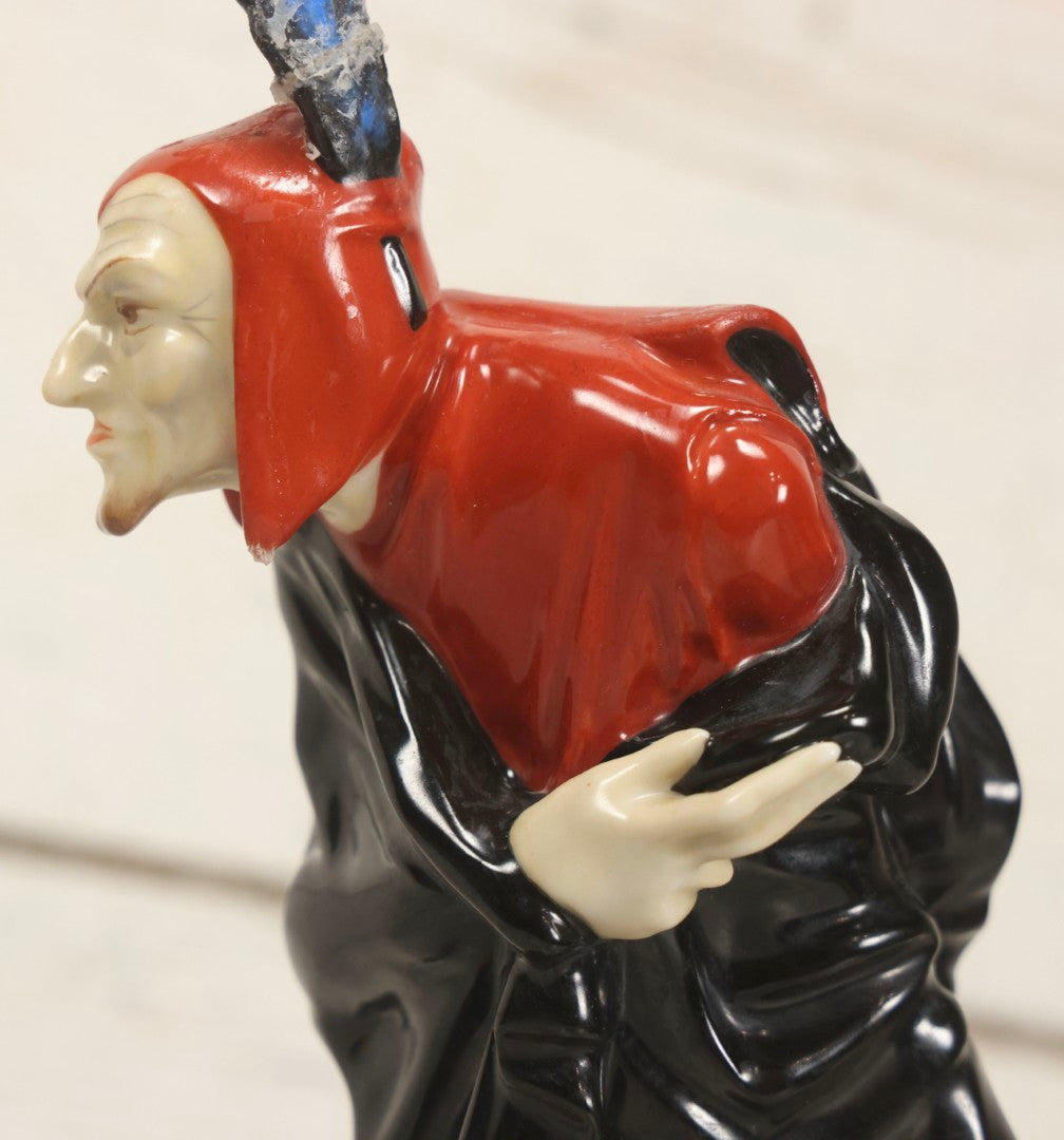 Lot 012 - Vintage Porcelain Mephisto (Mephistopheles) Figurine, By Karl Tutter For Hutschenreuther, Germany, Kunstabteilung, U.S. Zone Mark, Note Feather-On-Hat And Hood Repaired With Visible Glue, Circa 1955, 11-1/2" H