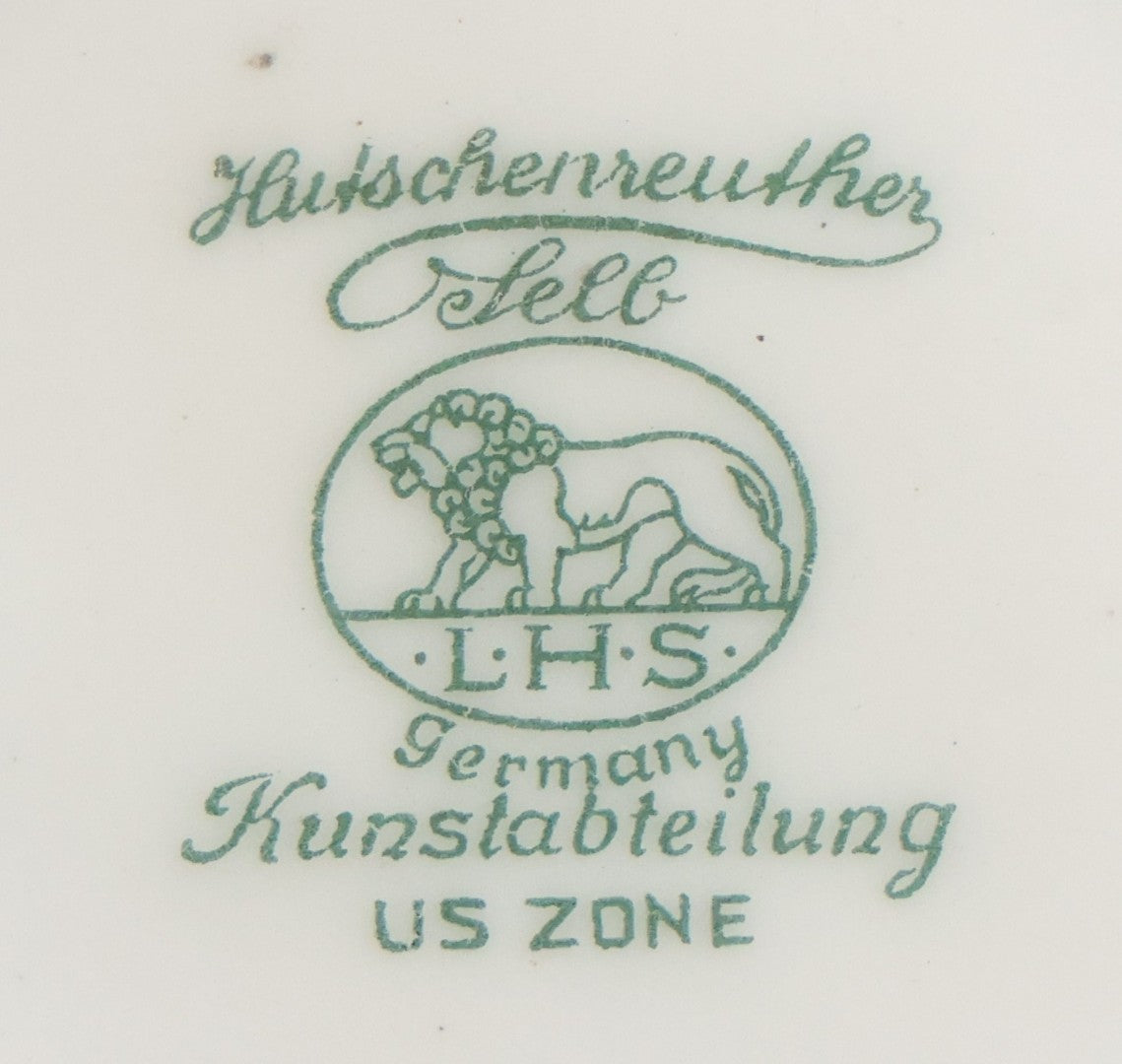 Lot 012 - Vintage Porcelain Mephisto (Mephistopheles) Figurine, By Karl Tutter For Hutschenreuther, Germany, Kunstabteilung, U.S. Zone Mark, Note Feather-On-Hat And Hood Repaired With Visible Glue, Circa 1955, 11-1/2" H