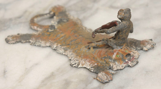 Lot 017 - Antique Cold-Painted Metal Paperweight Figurine Of Violin-Playing Monkey On Taxidermy Tiger Rug, Likely Austrian Or German