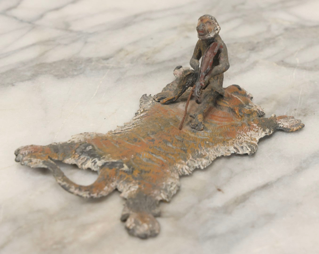 Lot 017 - Antique Cold-Painted Metal Paperweight Figurine Of Violin-Playing Monkey On Taxidermy Tiger Rug, Likely Austrian Or German