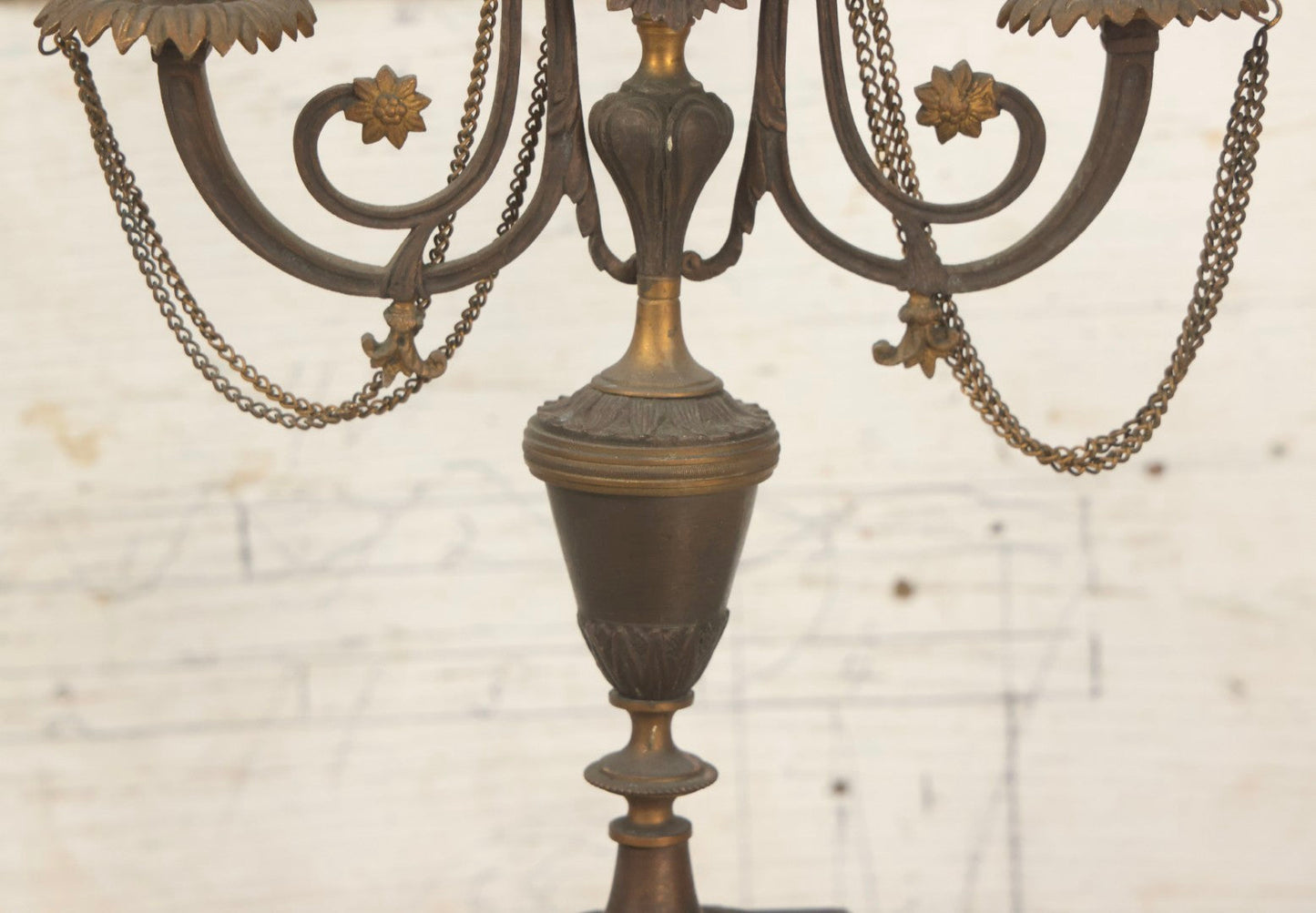 Lot 018 - Pair Of Antique Brass Three-Arm Candelabras With Floral Rosettes, Chains, And Ornate Ornamentation On Black Slate Bases, Circa 1850, 13-1/2" H Each