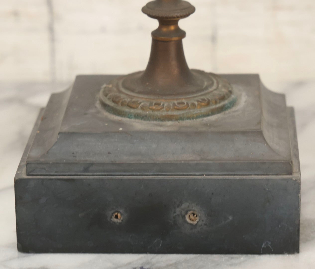 Lot 018 - Pair Of Antique Brass Three-Arm Candelabras With Floral Rosettes, Chains, And Ornate Ornamentation On Black Slate Bases, Circa 1850, 13-1/2" H Each