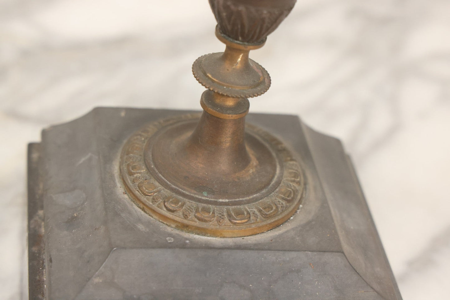 Lot 018 - Pair Of Antique Brass Three-Arm Candelabras With Floral Rosettes, Chains, And Ornate Ornamentation On Black Slate Bases, Circa 1850, 13-1/2" H Each