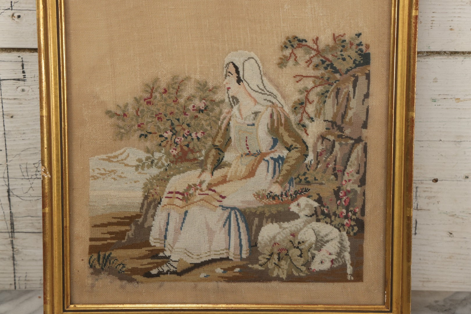 Lot 021 - Antique Framed Needlepoint Tapestry Depicting A Seated Woman With Lambs, Circa Mid 19th Century, In Gilt Wood Frame, Far Gallery, New York, 11-3/4" x 13-1/2"