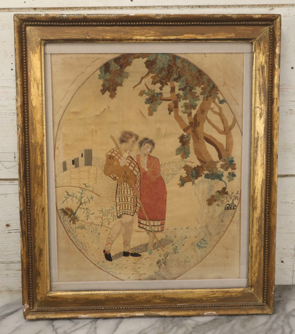 Lot 022 - Antique Framed Needlework Embroidery Depicting A Pastoral Scene With A Scottish Couple Beneath A Tree, Circa Early 19th Century, In Gilt Wood Frame, Arteffects Gallery, Northampton, Massachusetts, 17" x 19-3/4"
