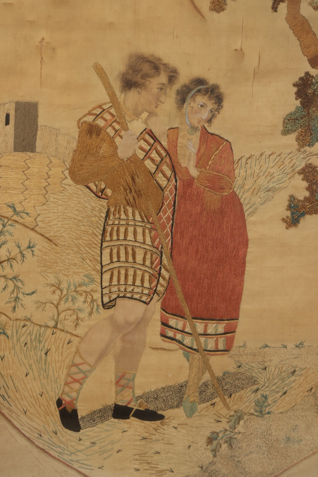 Lot 022 - Antique Framed Needlework Embroidery Depicting A Pastoral Scene With A Scottish Couple Beneath A Tree, Circa Early 19th Century, In Gilt Wood Frame, Arteffects Gallery, Northampton, Massachusetts, 17" x 19-3/4"