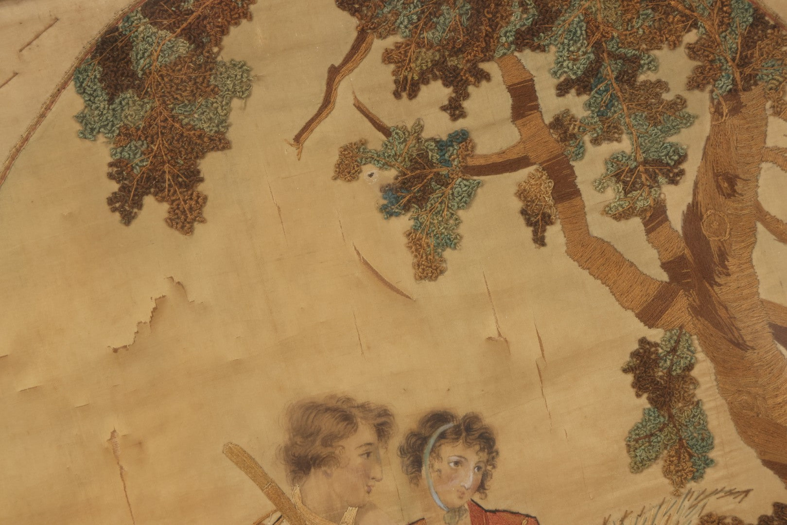 Lot 022 - Antique Framed Needlework Embroidery Depicting A Pastoral Scene With A Scottish Couple Beneath A Tree, Circa Early 19th Century, In Gilt Wood Frame, Arteffects Gallery, Northampton, Massachusetts, 17" x 19-3/4"