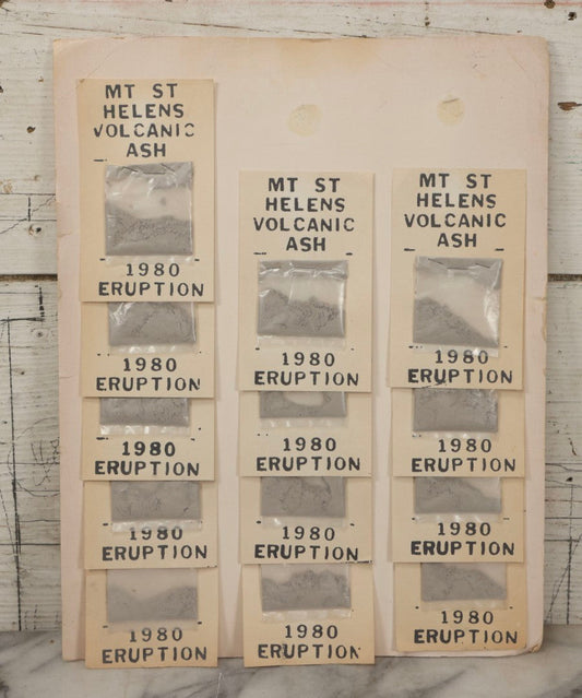 Lot 034 - Vintage Souvenir Display Board Of “Mt. St. Helens Volcanic Ash, 1980 Eruption,” With 13 Remaining Samples