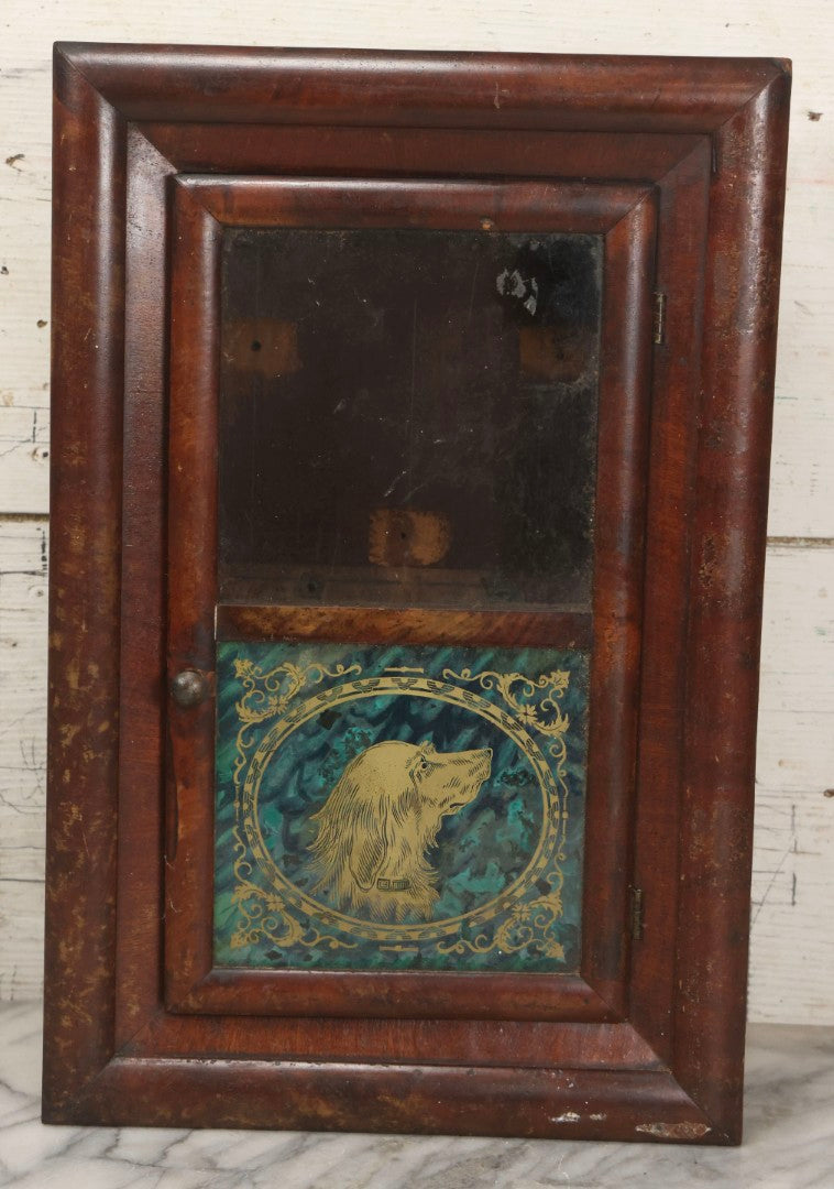 Lot 037 - Antique Wooden Clock Case With Reverse-Painted Dog Head Decoration, Seth Thomas, Thomaston, Connecticut, With Paper Label From O.J. Dodge, Watchmaker And Jeweler, Barre, Vermont, 13-3/4" x 16-1/2"