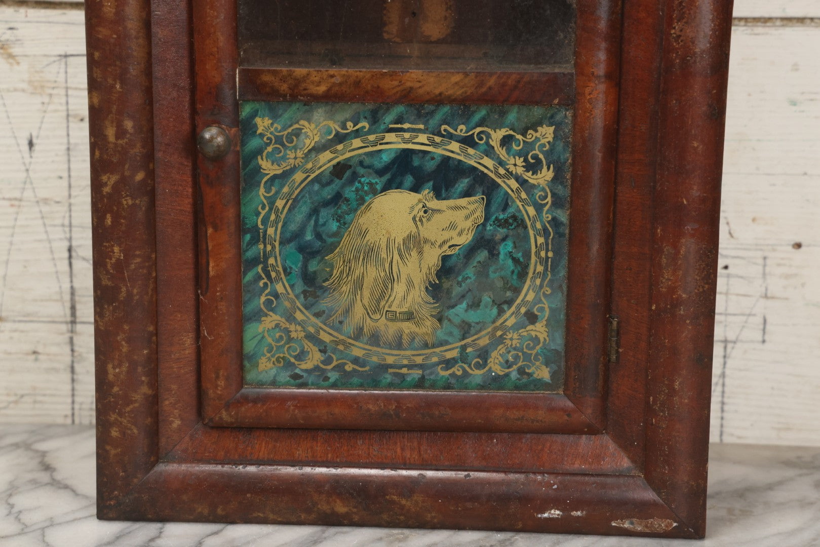 Lot 037 - Antique Wooden Clock Case With Reverse-Painted Dog Head Decoration, Seth Thomas, Thomaston, Connecticut, With Paper Label From O.J. Dodge, Watchmaker And Jeweler, Barre, Vermont, 13-3/4" x 16-1/2"