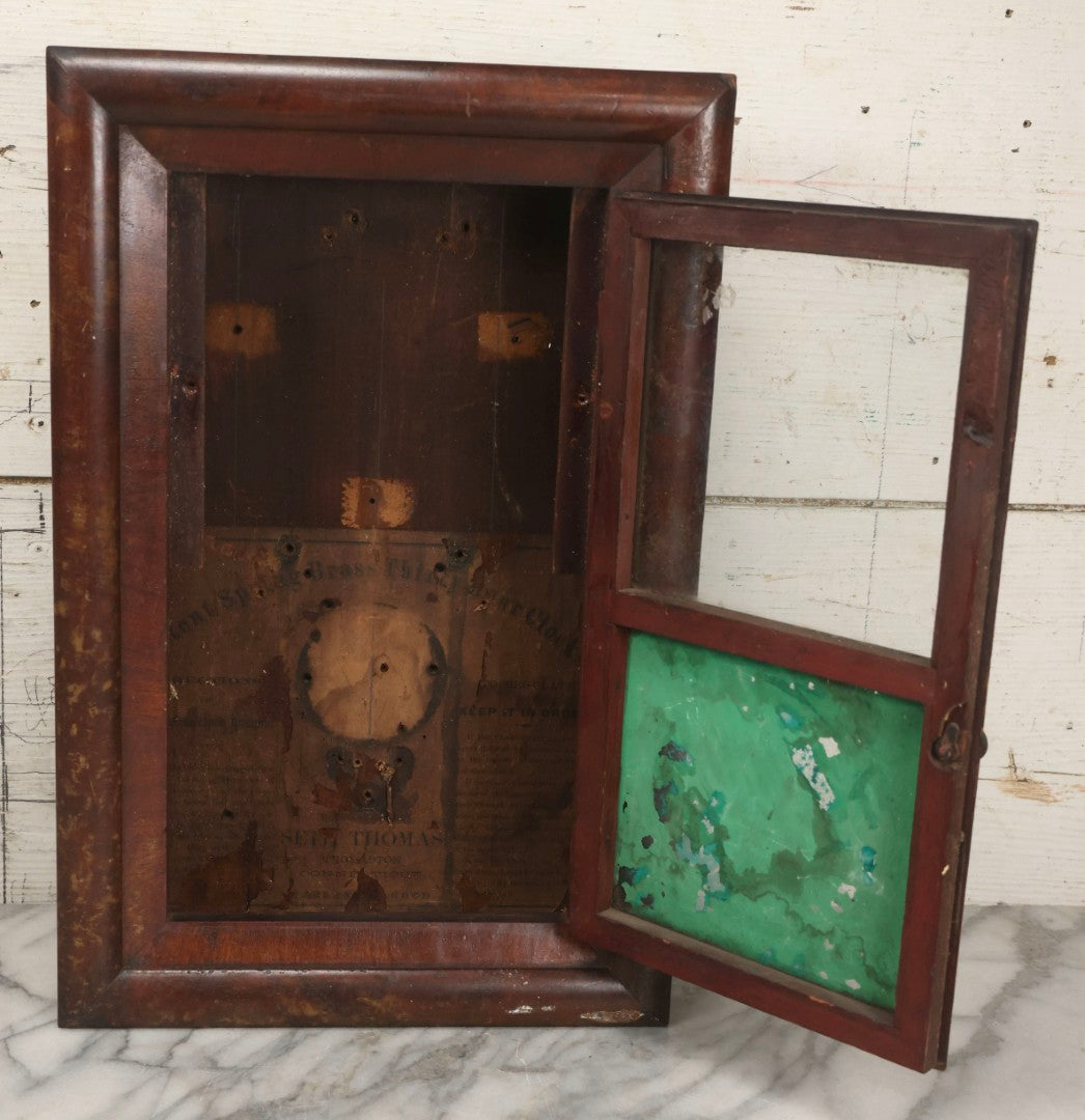Lot 037 - Antique Wooden Clock Case With Reverse-Painted Dog Head Decoration, Seth Thomas, Thomaston, Connecticut, With Paper Label From O.J. Dodge, Watchmaker And Jeweler, Barre, Vermont, 13-3/4" x 16-1/2"