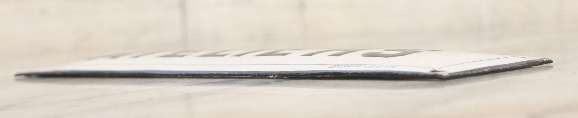 Lot 039 - Antique Convex Porcelain Sign “Ateliers” ( French, "Workshops") With Black Letters On White Field And Navy Blue Pinstripes, Marked "Busath-Brux," Édouard Busath, Brussels, Belgium, 9-7/8" x 2-3/4"