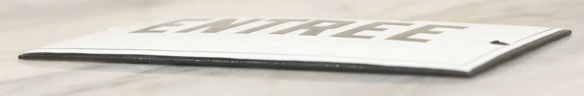 Lot 040 - Antique Convex Porcelain Sign “Entrée” (French, "Entrance") With Black Letters On White Field And Black Pinstripe Border, Attributed To Édouard Busath, Brussels, Belgium, 5-1/2" x 2-3/4"