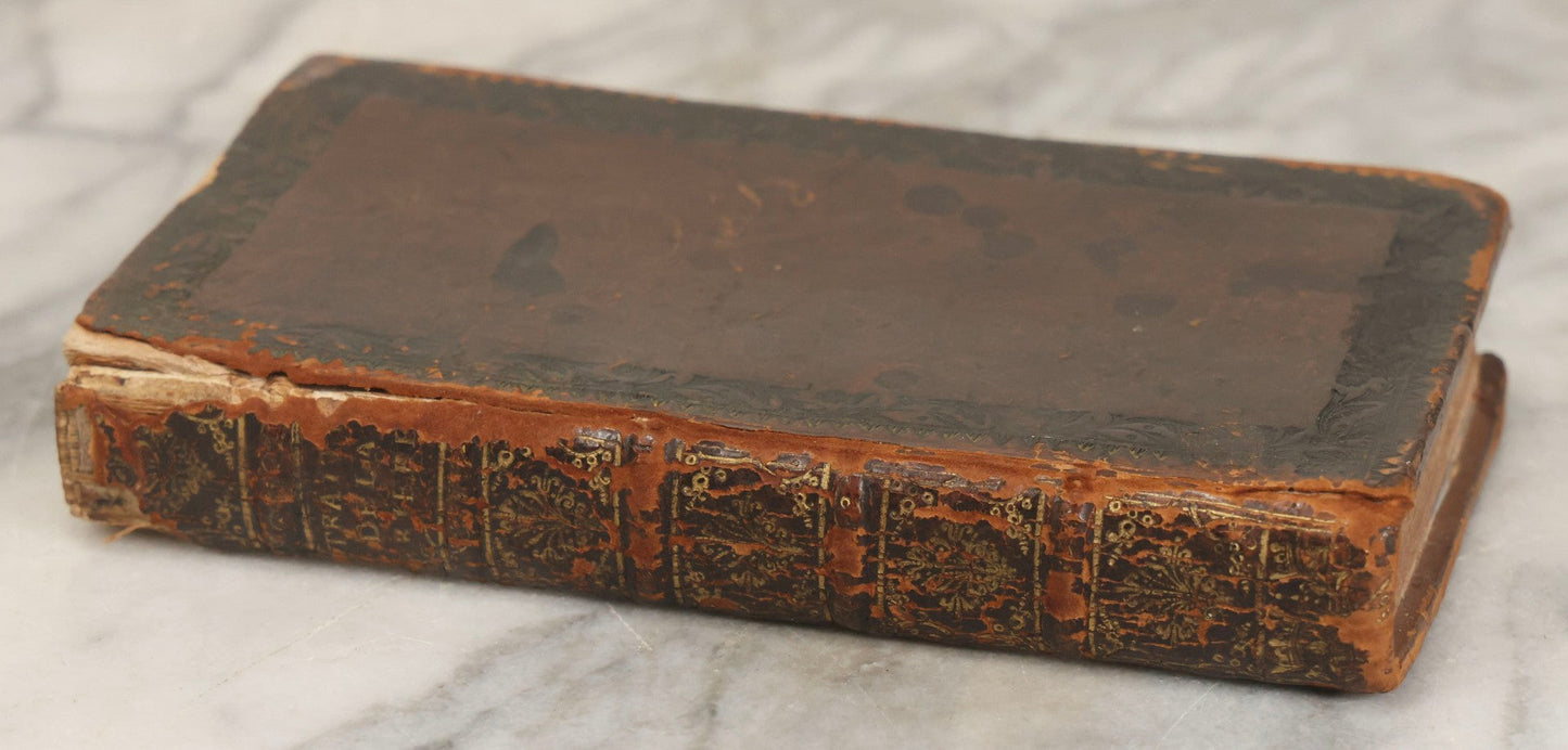 Lot 043 - Antique Hollowed Book Safe Made From “Traittez Sur La Prière Publique” (“Treatise On Public Prayer”), Bruxelles, 1707, By Eugene Henry Fricx, With French “P-V” Maker's Stamp