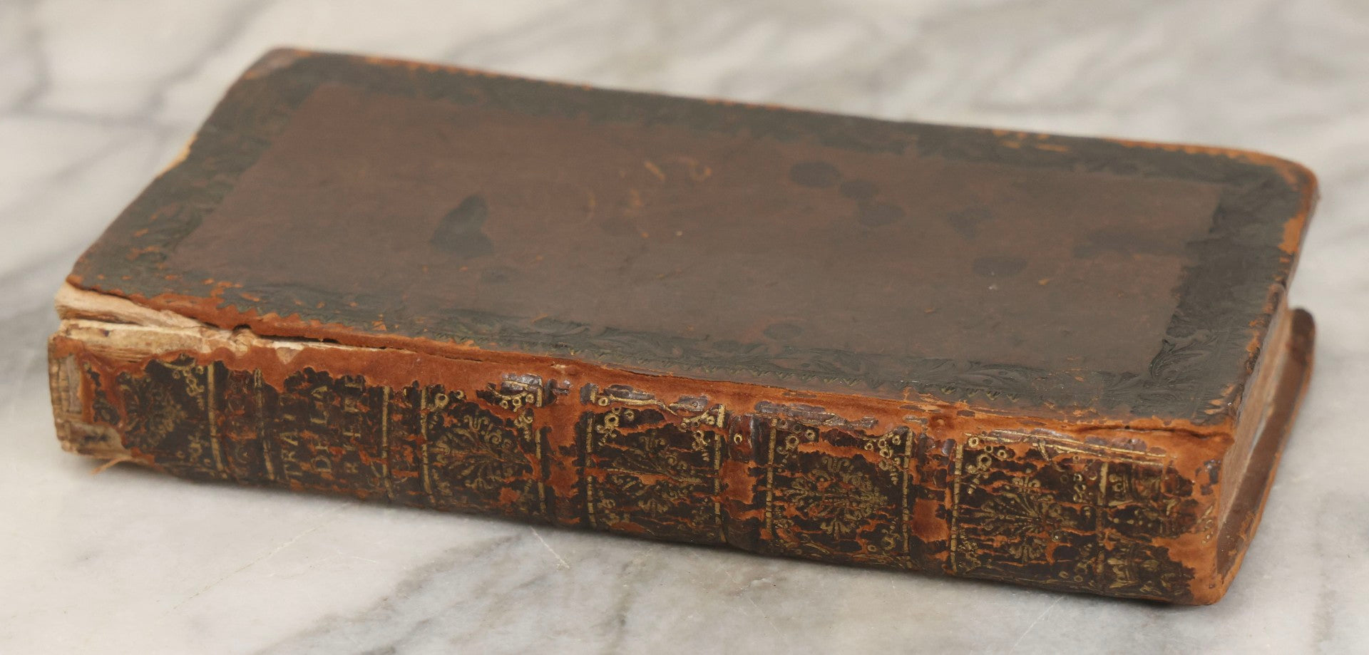 Lot 043 - Antique Hollowed Book Safe Made From “Traittez Sur La Prière Publique” (“Treatise On Public Prayer”), Bruxelles, 1707, By Eugene Henry Fricx, With French “P-V” Maker's Stamp