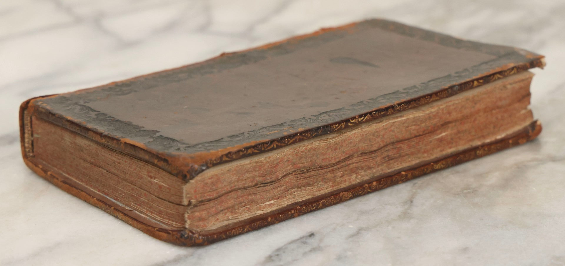 Lot 043 - Antique Hollowed Book Safe Made From “Traittez Sur La Prière Publique” (“Treatise On Public Prayer”), Bruxelles, 1707, By Eugene Henry Fricx, With French “P-V” Maker's Stamp