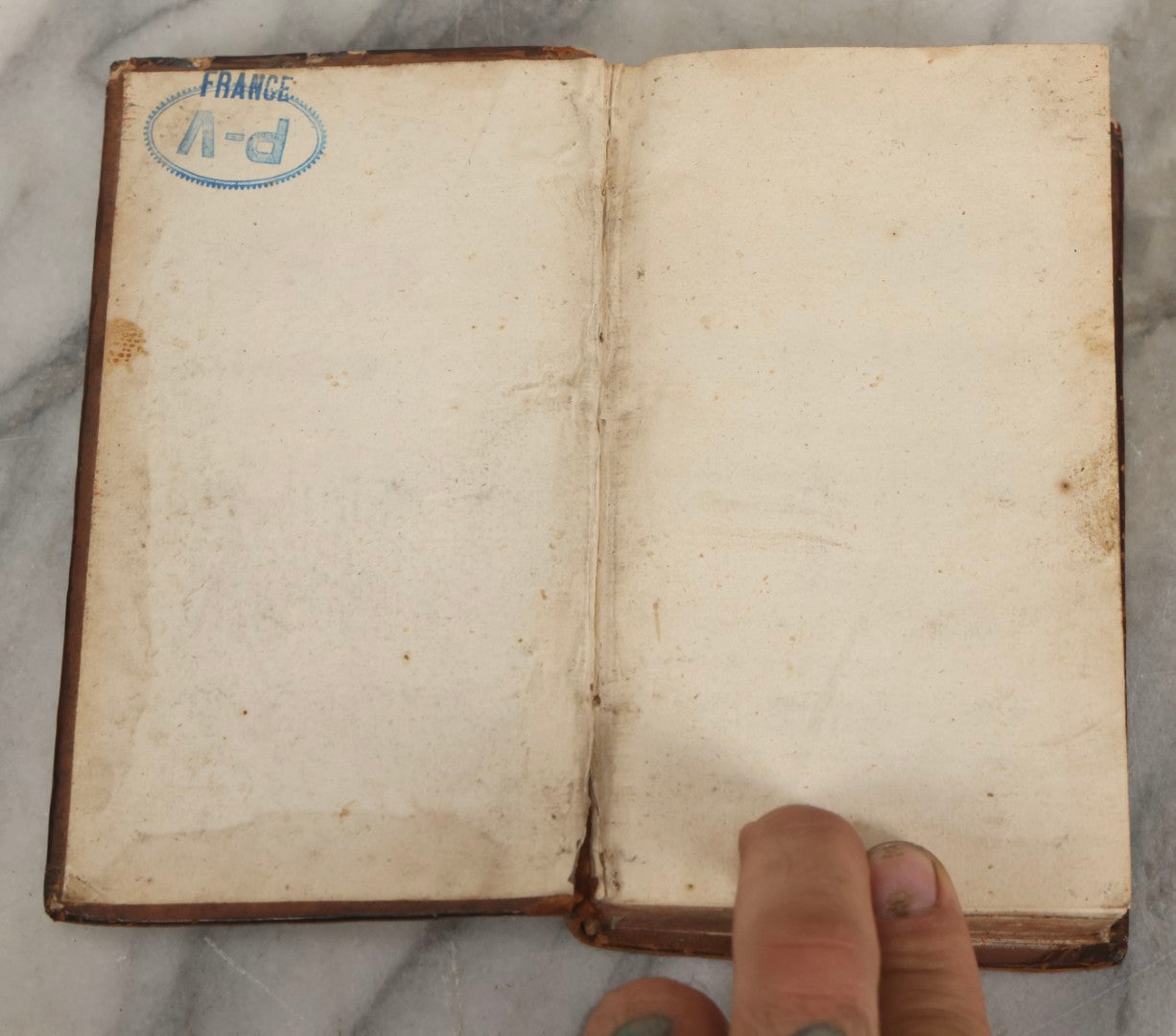 Lot 043 - Antique Hollowed Book Safe Made From “Traittez Sur La Prière Publique” (“Treatise On Public Prayer”), Bruxelles, 1707, By Eugene Henry Fricx, With French “P-V” Maker's Stamp