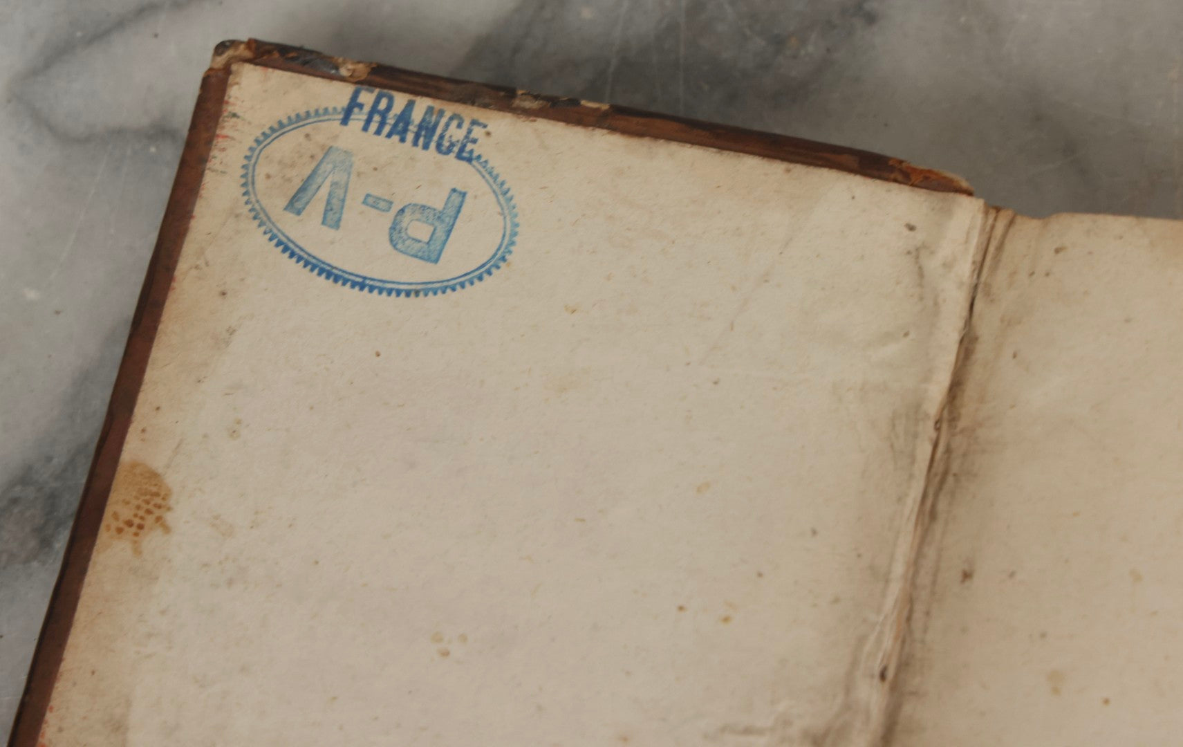 Lot 043 - Antique Hollowed Book Safe Made From “Traittez Sur La Prière Publique” (“Treatise On Public Prayer”), Bruxelles, 1707, By Eugene Henry Fricx, With French “P-V” Maker's Stamp