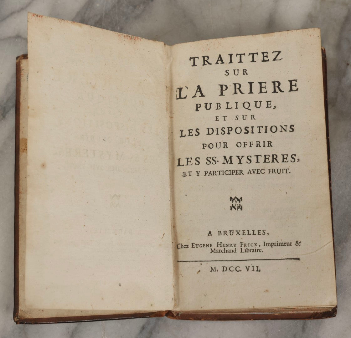 Lot 043 - Antique Hollowed Book Safe Made From “Traittez Sur La Prière Publique” (“Treatise On Public Prayer”), Bruxelles, 1707, By Eugene Henry Fricx, With French “P-V” Maker's Stamp