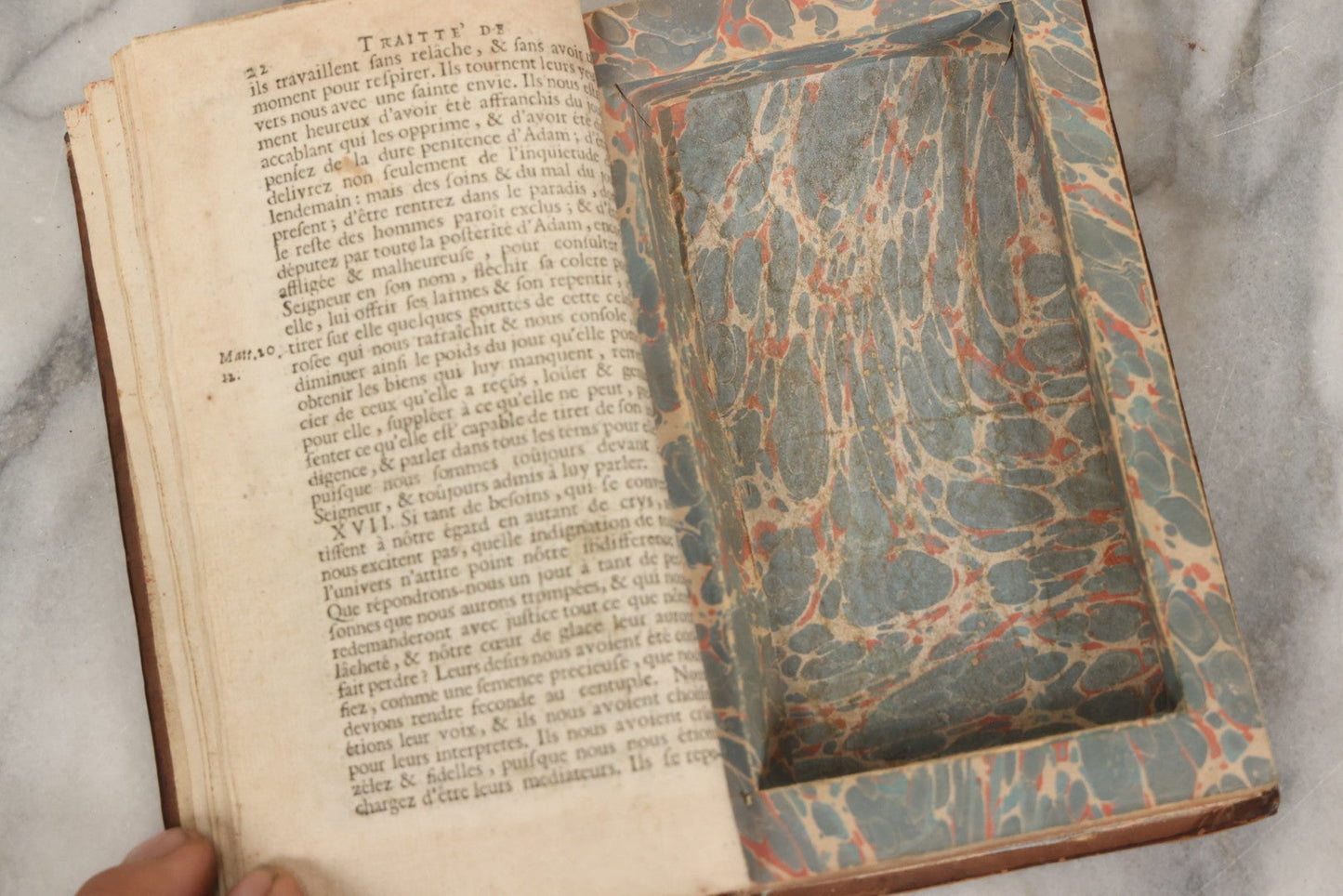 Lot 043 - Antique Hollowed Book Safe Made From “Traittez Sur La Prière Publique” (“Treatise On Public Prayer”), Bruxelles, 1707, By Eugene Henry Fricx, With French “P-V” Maker's Stamp