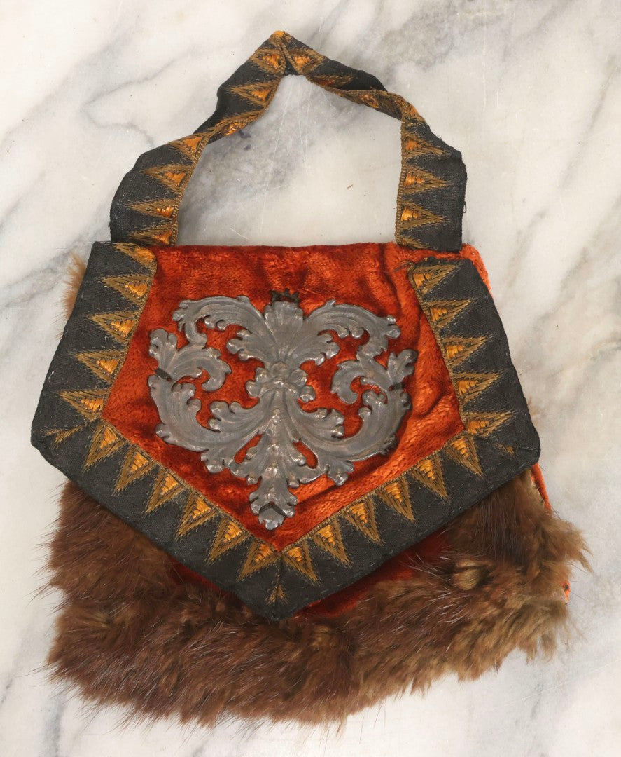 Lot 044 - Antique Victorian Red Velvet And Fur Handbag With Ornate Metal Filigree Appliqué And Brocade Interior