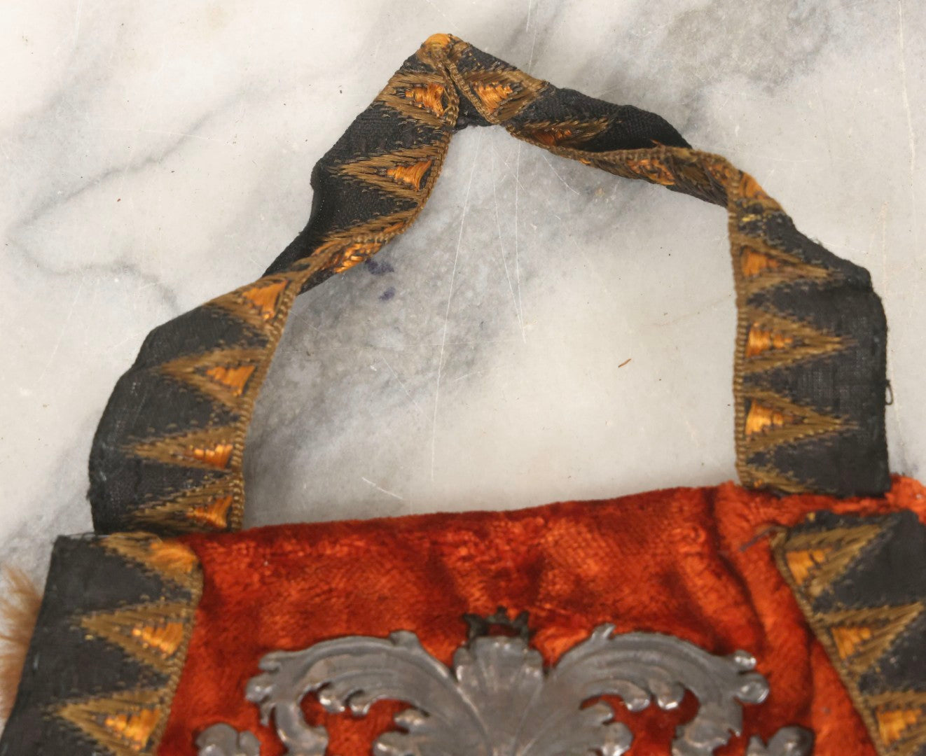 Lot 044 - Antique Victorian Red Velvet And Fur Handbag With Ornate Metal Filigree Appliqué And Brocade Interior