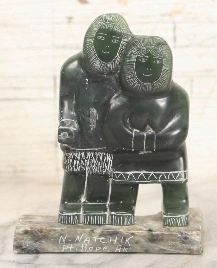 Lot 046 - Vintage Green Serpentine Stone Carving Of Two Figures In Parkas, Signed N. Natchik, Pt. Hope, Alaska, Possibly Inuit Or Alaskan Native, Unconfirmed, 5" H