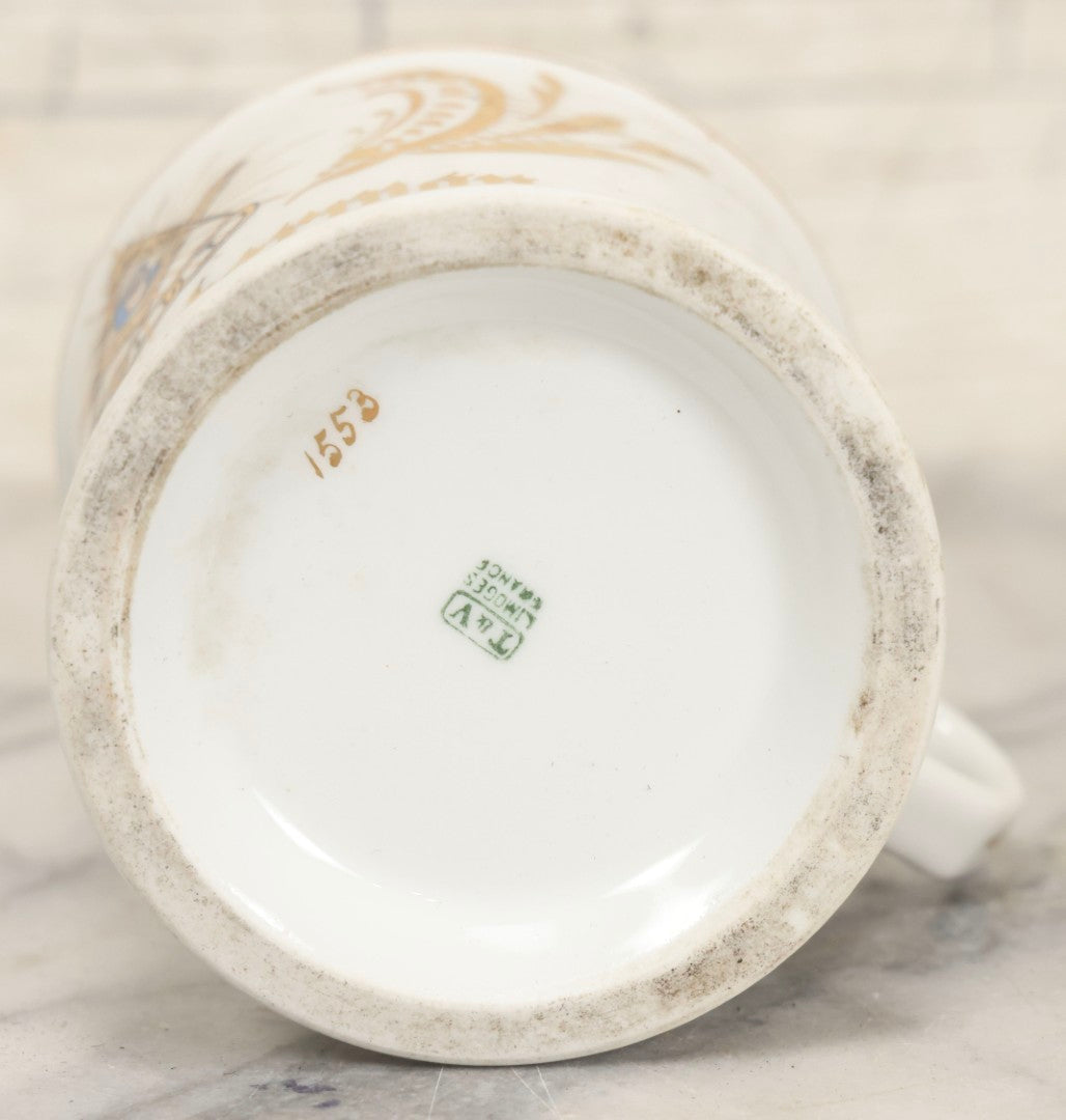 Lot 047 - Antique Hand-Decorated Porcelain Mug With Masonic Compass And Square, All-Seeing Eye, And Odd Fellows Three-Link F.L.T. Emblems, Belonging To V.E. Waterman, With Gold Painted Accents, T&V Limoges, France, 3-5/8" H