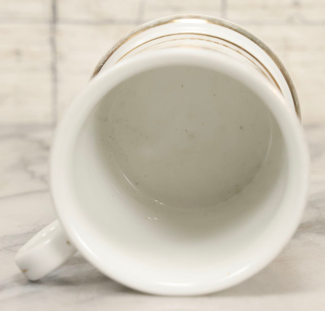 Lot 047 - Antique Hand-Decorated Porcelain Mug With Masonic Compass And Square, All-Seeing Eye, And Odd Fellows Three-Link F.L.T. Emblems, Belonging To V.E. Waterman, With Gold Painted Accents, T&V Limoges, France, 3-5/8" H