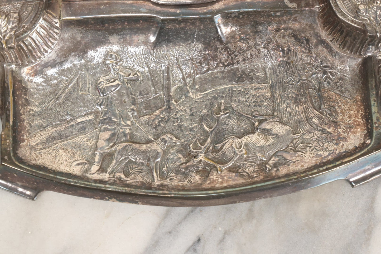 Lot 052 - Antique Cast Iron Double Inkwell With Chrome Finish Depicting Fox Head, Oak Branches, And English Hunting Scene With Hunter, Dog, And Stag, Stamped L.P., Circa Early 20th Century