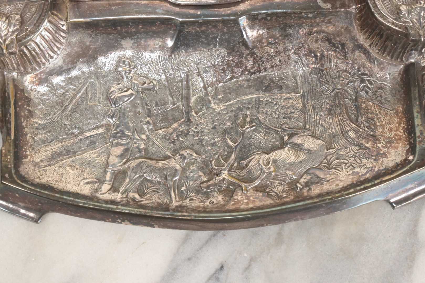 Lot 052 - Antique Cast Iron Double Inkwell With Chrome Finish Depicting Fox Head, Oak Branches, And English Hunting Scene With Hunter, Dog, And Stag, Stamped L.P., Circa Early 20th Century