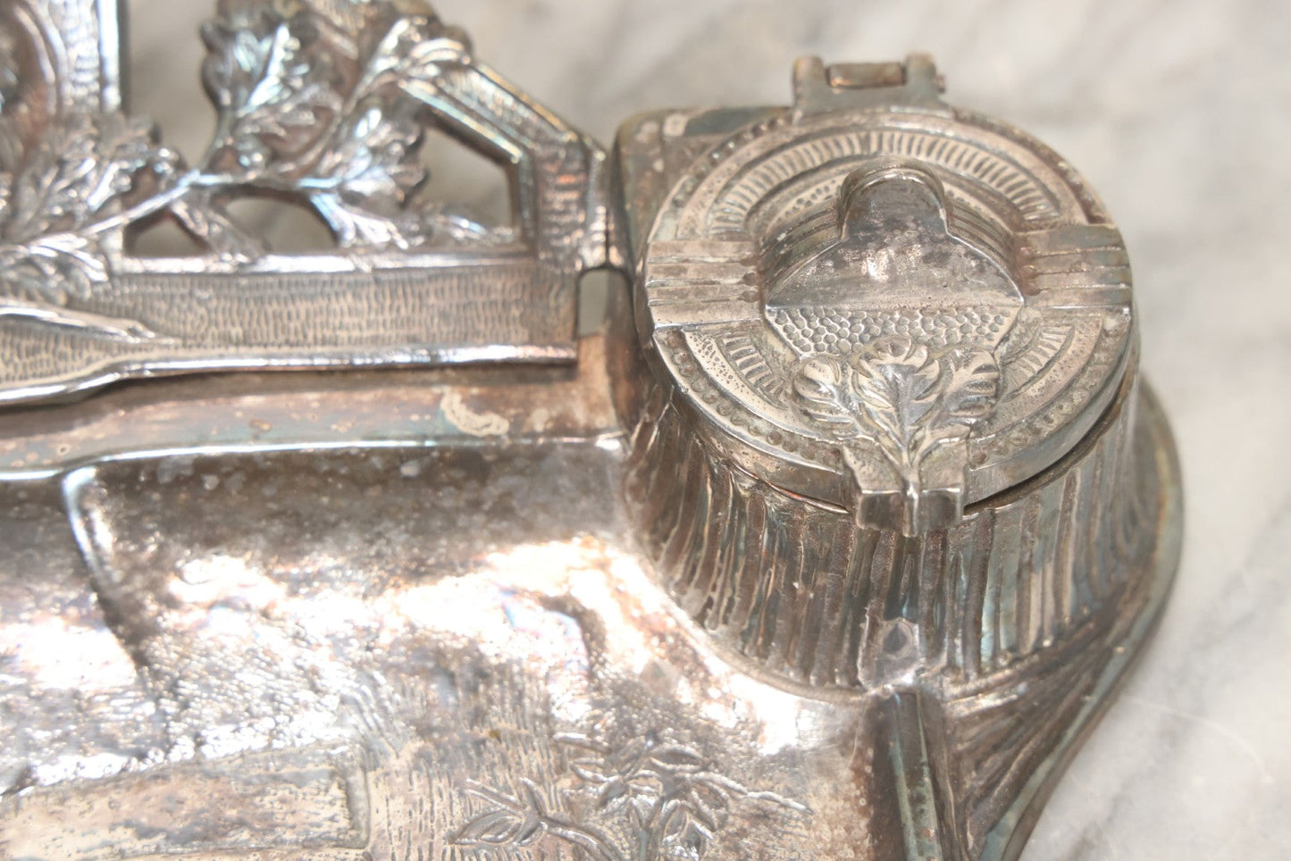 Lot 052 - Antique Cast Iron Double Inkwell With Chrome Finish Depicting Fox Head, Oak Branches, And English Hunting Scene With Hunter, Dog, And Stag, Stamped L.P., Circa Early 20th Century