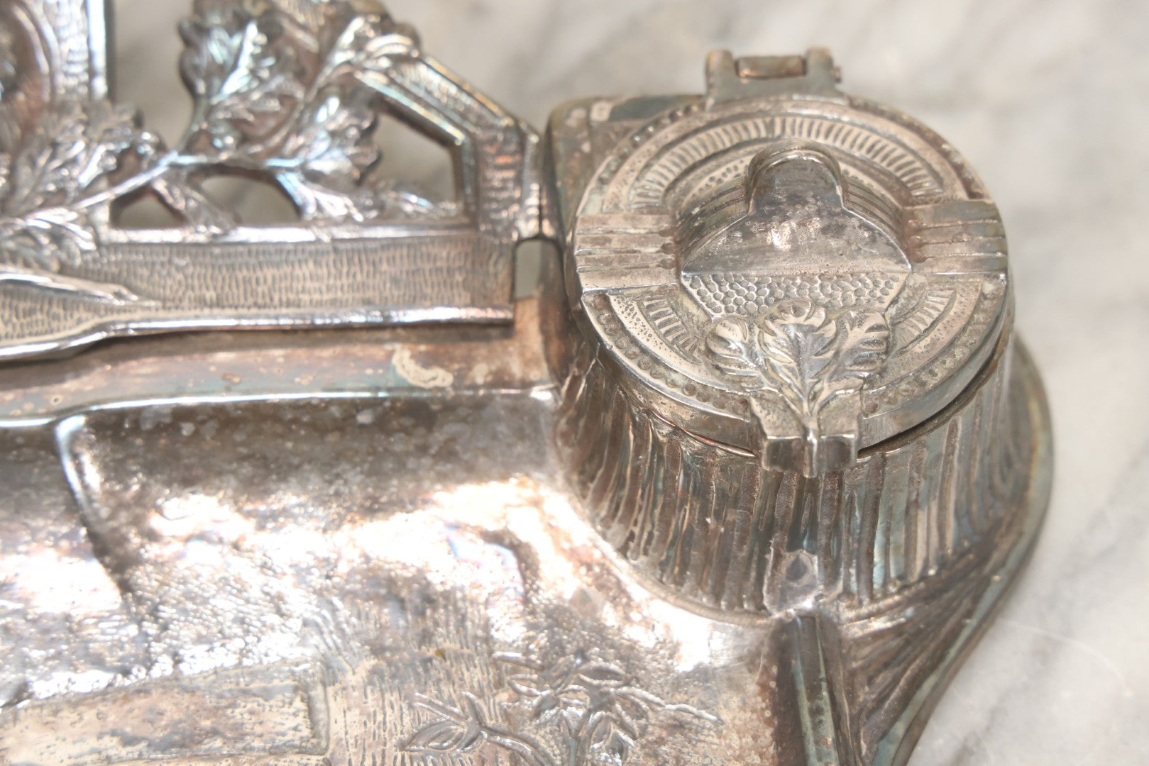 Lot 052 - Antique Cast Iron Double Inkwell With Chrome Finish Depicting Fox Head, Oak Branches, And English Hunting Scene With Hunter, Dog, And Stag, Stamped L.P., Circa Early 20th Century